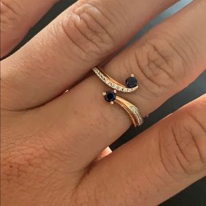 10k rose gold ring with white and blue sapphires